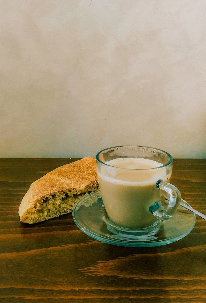 Tasse of coffee and bread